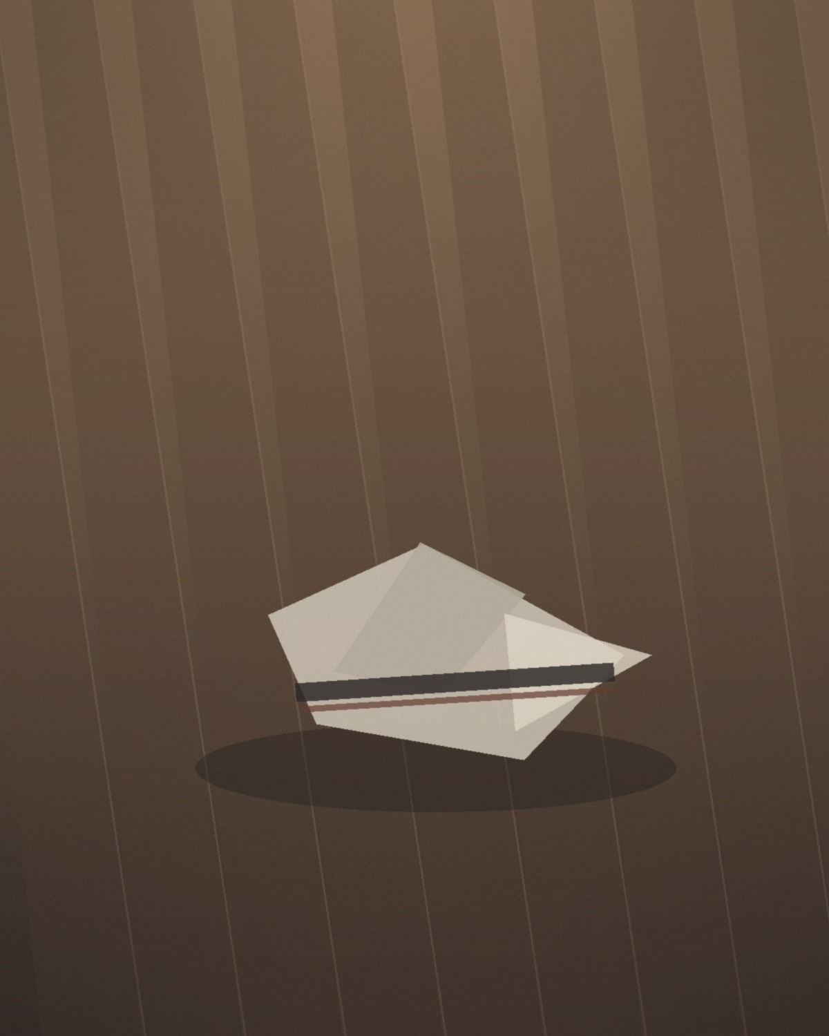 A folded practice uniform on a dojo floor